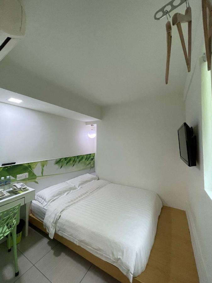 กรีน แอปเปิ้ล บูทิก โฮเต็ล Hotel โกตาคินาบาลู ภายนอก รูปภาพ