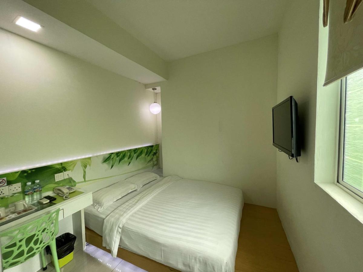 กรีน แอปเปิ้ล บูทิก โฮเต็ล Hotel โกตาคินาบาลู ภายนอก รูปภาพ