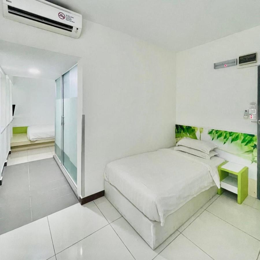 กรีน แอปเปิ้ล บูทิก โฮเต็ล Hotel โกตาคินาบาลู ภายนอก รูปภาพ